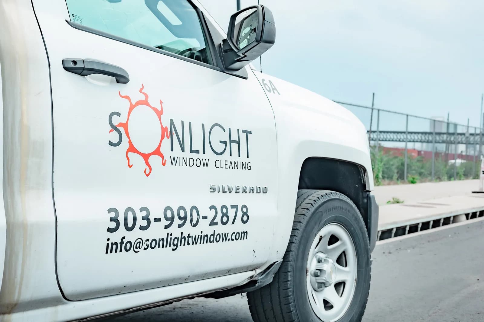 Sonlight technician walking to the next Front Range job — Littleton, Colorado