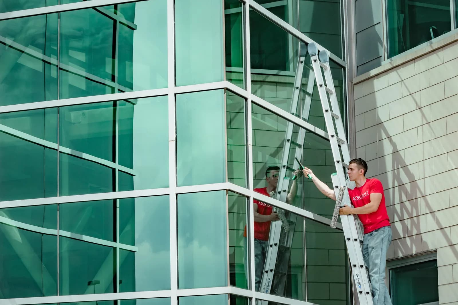 Sonlight team cleaning a Front Range commercial building exterior — Aurora, Colorado
